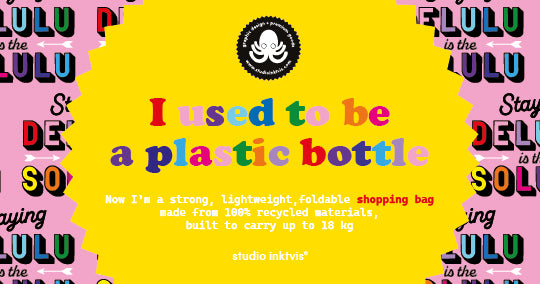 Pink rPET shopping bag with "Staying Delulu is the Solulu" text, featuring a yellow insert stating "I used to be a plastic bottle.