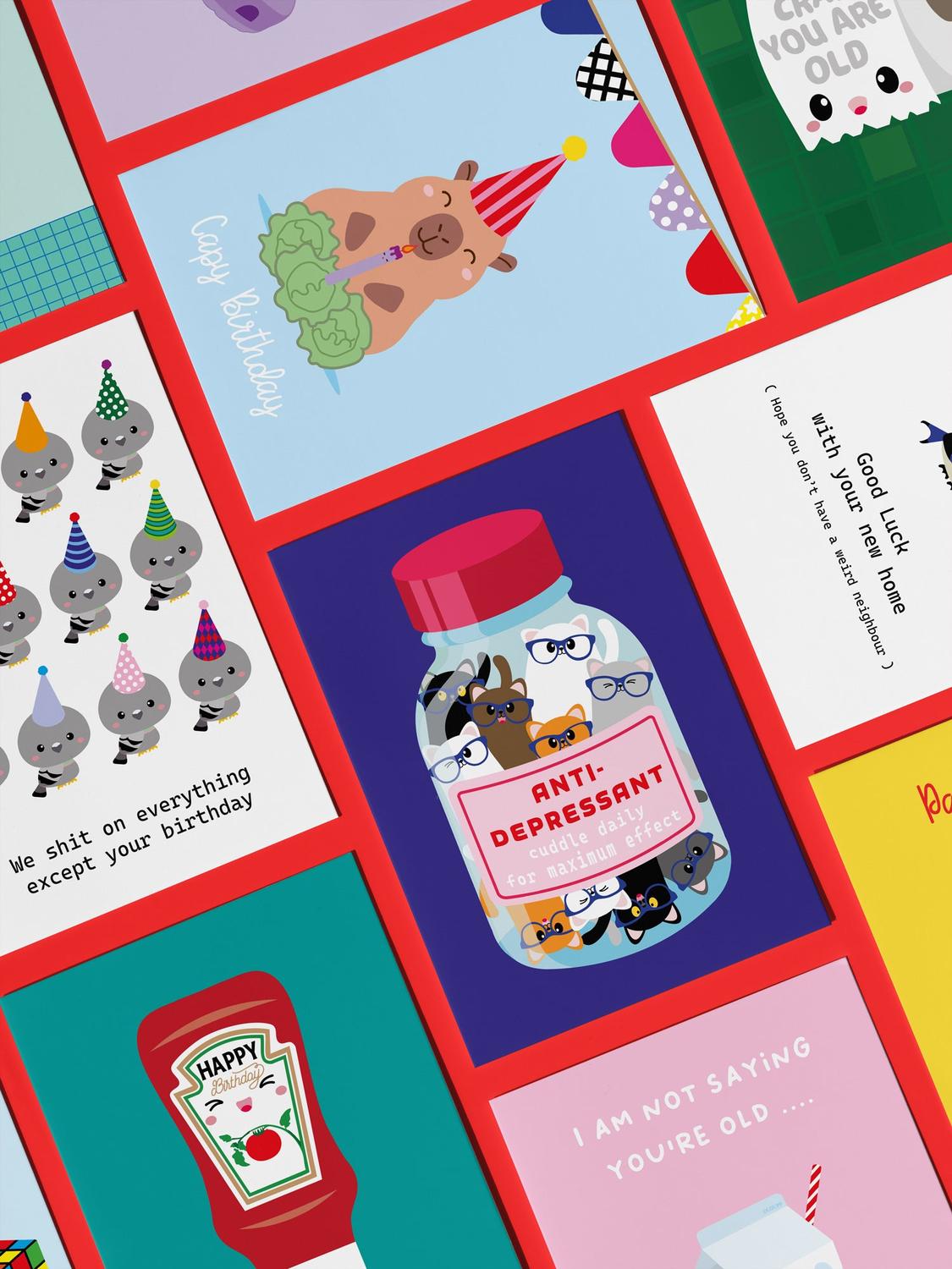 Humorous blue greeting card with a jar of cats wearing glasses and "Anti-Depressant" text.