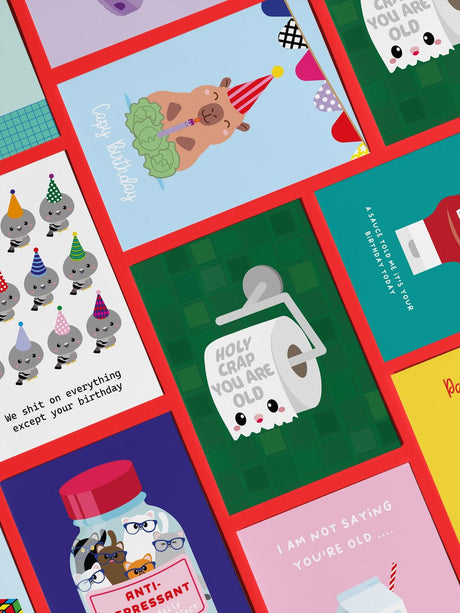 Green birthday card with "Holy Crap You Are Old" on a cute toilet paper roll.